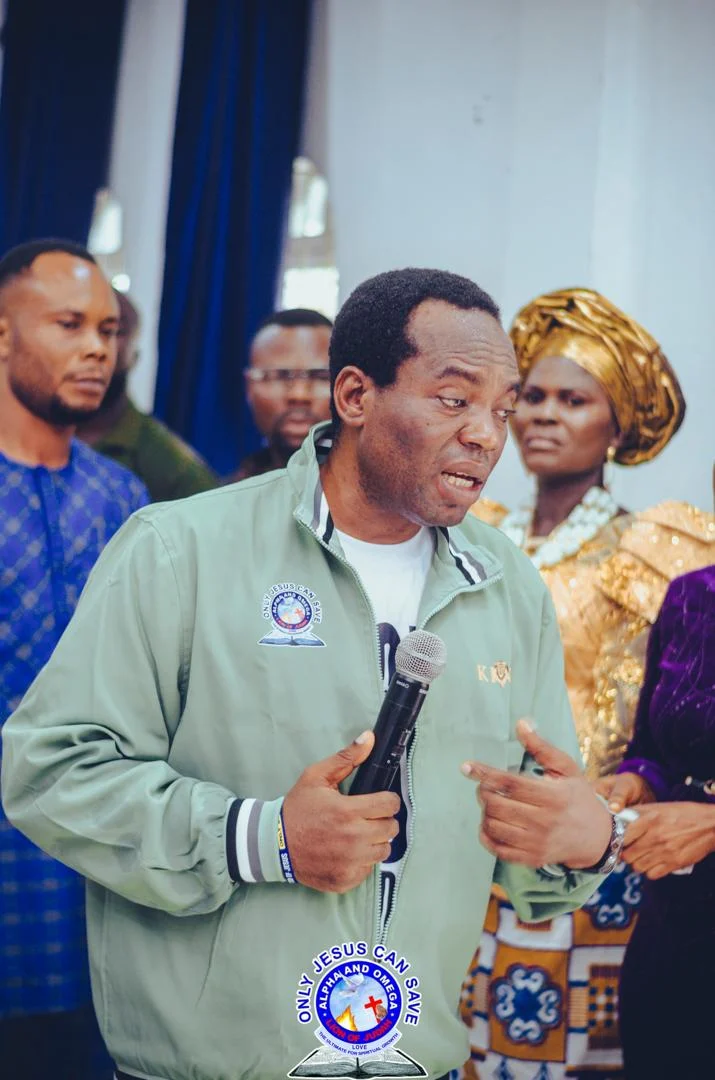 Pastor leading intimate worship with microphone in hand