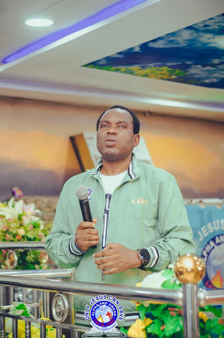 Pastor ministering on the altar at Only Jesus Can Save