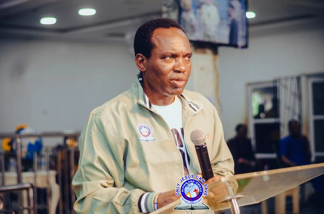 Pastor preaching energetically on the main altar