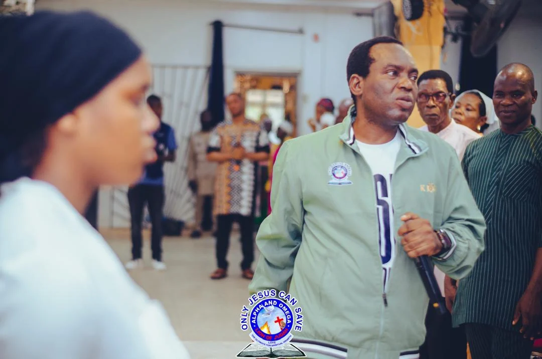 Pastor ministering directly to members during deliverance service